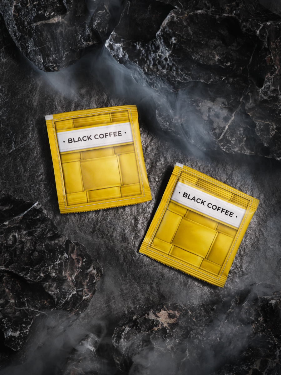 Multiple yellow COFFEECELL black coffee sachets